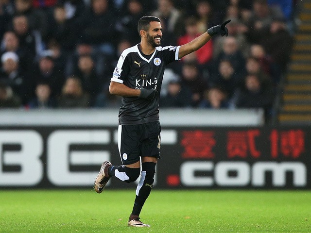 Riyad Mahrez of Leicester City celebrates scoring his team's first goal during the Barclays Premier League match between Swansea City and Leicester City at Liberty Stadium on December 5, 2015