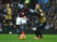 Idrissa Gueye of Aston Villa holds off Aaron Ramsey of Arsenal during the Barclays Premier League match between Aston Villa and Arsenal at Villa Park on December 13, 2015 in Birmingham, England.