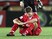 England's Liverpool FC captain Steven Garrard (lower) sits on the pitch after losing to South American champion Sao Paulo FC in the final match of the FIFA Club World Championship in Yokohama, 18 December 2005