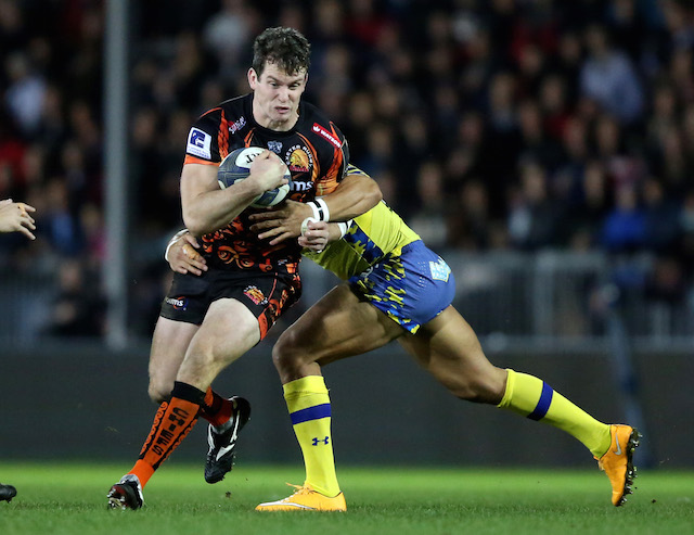 Sam Hill of Exeter Chiefs evades Hosea Gear of Clermont Auvergne during the European Rugby Champions Cup match between Exeter Chiefs and Clermont Auvergne at Sandy Park on December 12, 2015 in Exeter, England.