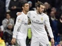 Gareth Bale puts a tender arm around Cristiano Ronaldo during the game between Real Madrid and Deportivo La Coruna on January 9, 2016
