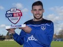 Gareth Evans of Portsmouth poses with his Player of the Month award for December 2015
