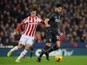 Emre Can and Ibrahim Afellay in action during the League Cup semi-final between Stoke and Liverpool on January 5, 2016