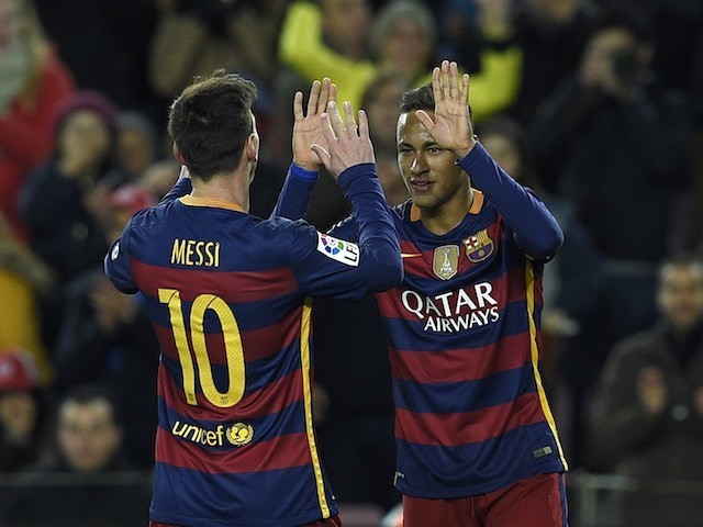 Neymar celebrates with Lionel Messi during the game between Barcelona and Athletic Bilbao on January 17, 2016