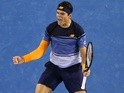 Milos Raonic celebrates winning match point in his quarter-final match against Gael Monfils during day 10 of the 2016 Australian Open at Melbourne Park on January 27, 2016
