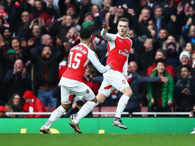 Calum Chambers of Arsenal celebrates scoring his team's first goal against Burnley at the Emirates Stadium on January 30, 2016