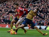 Little Adnan Januzaj is bullied by Gabriel during the Premier League game between Manchester United and Arsenal on February 28, 2016