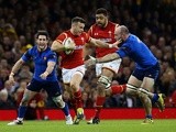 Gareth Davies of Wales hands off Antoine Burban of France during the Six Nations match at the Principality Stadium on February 26, 2016