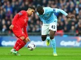 Roberto Firmino and Yaya Toure in action during the League Cup final between Liverpool and Manchester City on February 28, 2016