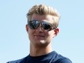 Marcus Ericsson walks across the paddock during previews to the Canadian Grand Prix on June 4, 2015
