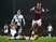 Mark Noble of West Ham United jumps a challenge from Erik Lamela of Tottenham Hotspur on March 2, 2016