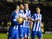 Tomer Hemed celebrates with teammates after scoring during the Championship game between Brighton & Hove Albion and Leeds United on February 29, 2016