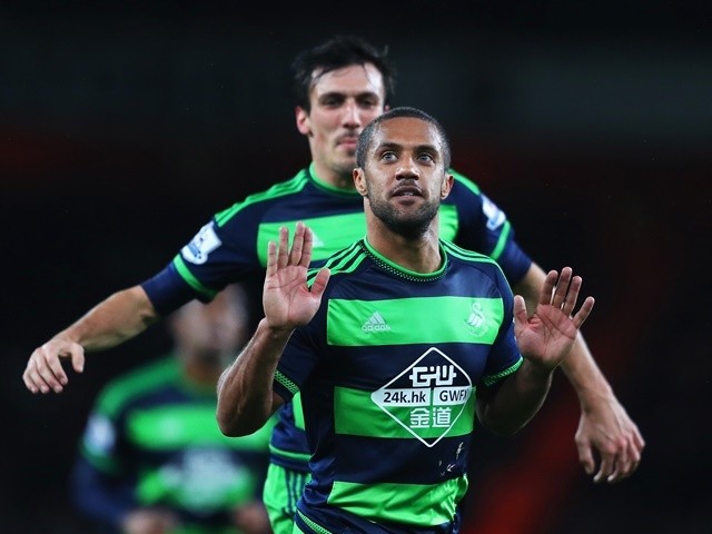 Wayne Routledge of Swansea City celebrates scoring the equalising goal against Arsenal on March 2, 2016