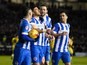 Tomer Hemed celebrates with teammates after scoring during the Championship game between Brighton & Hove Albion and Leeds United on February 29, 2016