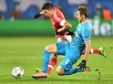 Nicolas Gaitan and Mauricio in action during the thrilling Champions League game between Zenit and Benfica on March 9, 2016