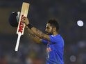 Virat Kohli of India celebrates after the World Twenty20 victory over Australia in Mohali on March 27, 2016