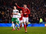 Simon Church celebrates scoring a late penalty during the friendly between Wales and Northern Ireland on March 24, 2016