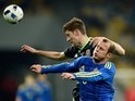 Ben Davies and Roman Zozulya in action during the international friendly between Ukraine and Wales on March 28, 2016