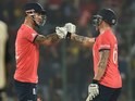 Jason Roy and Alex Hales bump fists during the World Twenty20 semi-final between England and New Zealand on March 30, 2016