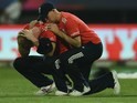 Joe Root consoles Ben Stokes after the World Twenty20 final between England and the West Indies at Eden Gardens on April 3, 2016