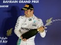 Nico Rosberg celebrates winning the Bahrain GP with some sparkling wine on April 3, 2016