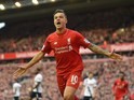 Philippe Coutinho celebrates scoring during the Premier League match between Liverpool and Tottenham Hotspur on April 2, 2016
