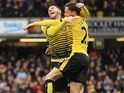 Jose Holebas celebrates the equaliser with Etienne Capoue during the Premier League game between Watford and Everton on April 9, 2016