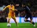 Yannick Carrasco and Lionel Messi in action during the Champions League quarter-final between Barcelona and Atletico Madrid on April 5, 2016
