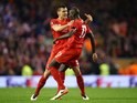Dejan Lovren celebrates with Mamadou Sakho during the Europa League quarter-final between Liverpool and Borussia Dortmund on April 14, 2016