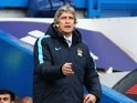 Manuel Pellegrini gives orders during the Premier League game between Chelsea and Manchester City on April 16, 2016