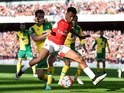 Big old Alex Iwobi and Jonny Howson in action during the Premier League game between Arsenal and Norwich City on April 30, 2016
