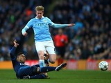 Manchester City midfielder Kevin de Bruyne is challenged by Real Madrid's Casemiro during the Champions League semi-final first leg on April 26, 2016