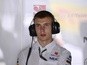 Sergey Sirotkin stands in the pits during the second practice session at the Autodromo Nazionale circuit in Monza on September 6, 2013
