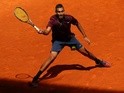 Nick Kyrgios plays a forehand during his straight-sets victory against Stanislas Wawrinka in their second-round match during day five of the Madrid Open on May 04, 2016