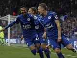 Leicester City's Jamie Vardy celebrates with Riyad Mahrez after scoring against Everton on May 7, 2016