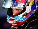 Max Verstappen of Red Bull Racing puts his helmet on in the garage during previews to the Spanish Formula One Grand Prix at Circuit de Catalunya on May 12, 2016