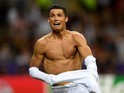Cristiano Ronaldo celebrates scoring the winning penalty during the Champions League final between Real Madrid and Atletico Madrid on May 28, 2016