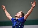 David Goffin celebrates winning his third-round match at the French Open on May 28, 2016