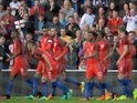 England players congratulate Marcus Rashford's debut goal during the 2-1 win over Australia at the Stadium of Light on May 27, 2016