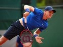 Kyle Edmund in action against Nikoloz Basilashvili on day two of the French Open at Roland Garros on May 23, 2016