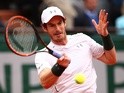 Andy Murray of Great Britain hits a forehand against Stanislas Wawrinka at Roland Garros on June 3, 2016
