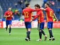 Spain's players celebrate after scoring during the international friendly football match against South Korea on June 1, 2016