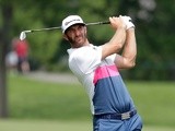 Dustin Johnson hits his second shot on the 14th hole during the first round of the Memorial Tournament on June 2, 2016