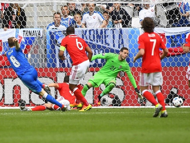 Slovakia's midfielder Ondrej Duda shoots and scores his team's first goal during the Euro 2016 Group B match against Wales on June 11, 2016