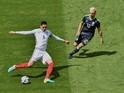 Aaron Ramsey and Chris Smalling in action during the Euro 2016 Group B game between England and Wales on June 16, 2016