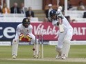 England's Alex Hales plays a shot watched by Sri Lanka's Dinesh Chandimal on the fourth day of the third Test on June 12, 2016