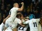 Owen Farrell of England is congratulated by Mike Brown and his teammates after scoring the winning try during the international Test match against Australia on June 18, 2016