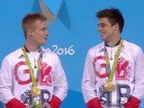 Chris Mears and Jack Laugher pose with their gold medals after winning the men's 3m synchro at the Rio Olympics on August 10, 2016