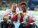 Hannah Cockroft and Kare Adenegan pose with their medals after the women's 100m T34 final at the Paralympic Games in Rio de Janeiro on September 10, 2016