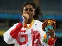 ParalympicGB sprinter Kadeena Cox poses with her bronze medal after the women's T38 100m final at the Rio Games on September 9, 2016